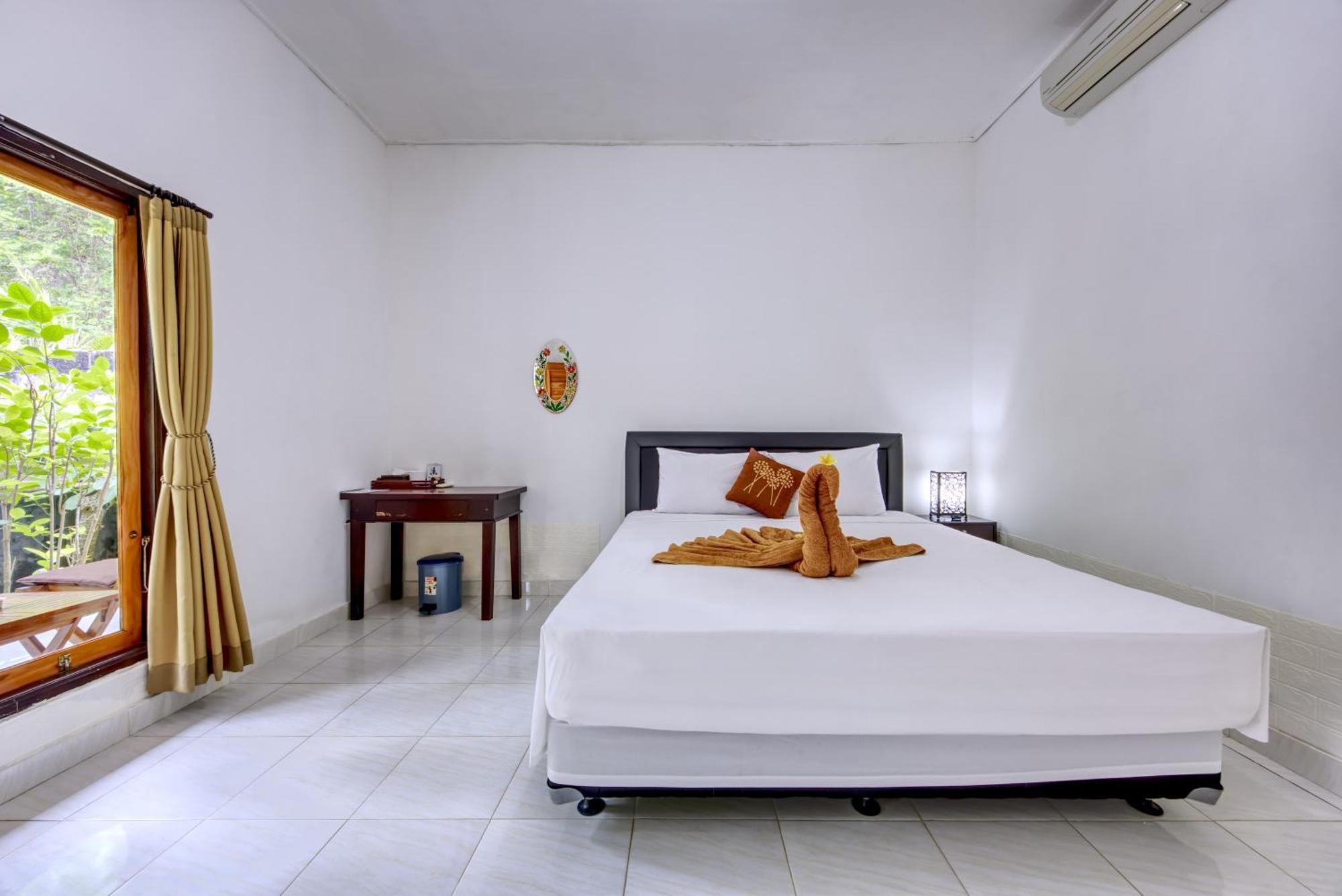 Ari La Casa Hotel Toyapakeh ภายนอก รูปภาพ